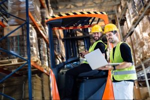 people working in warehouse e1670342042805